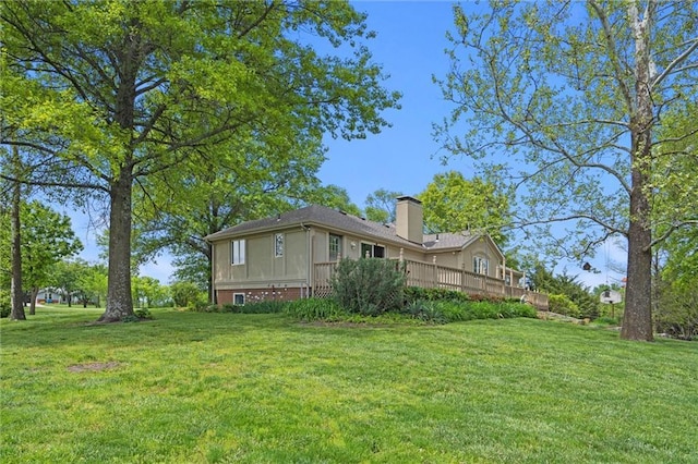 19864 211th St, Tonganoxie, KS 66086 - view of green lawn featuring a wooden deck