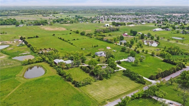 19864 211th St, Tonganoxie, KS 66086 - aerial view of property and surrounding area with a nearby body of water and rural landscape