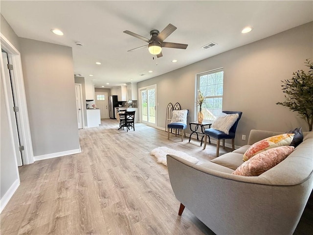 112 Benton St, Pleasant Hill, MO 64080 - living room featuring recessed lighting, visible vents, light wood-type flooring, and a ceiling fan