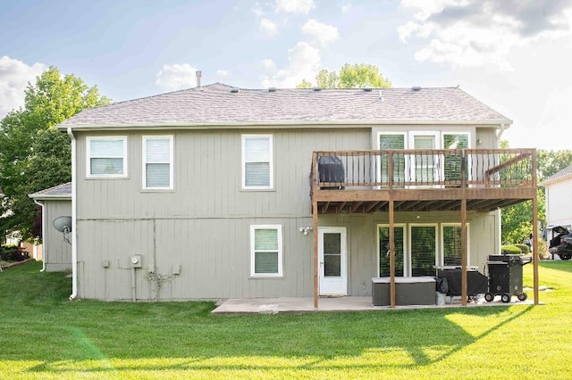 5773 Meadow Heights Dr, Shawnee, KS 66226 - back of house featuring a patio area, a wooden deck, a yard, and roof with shingles