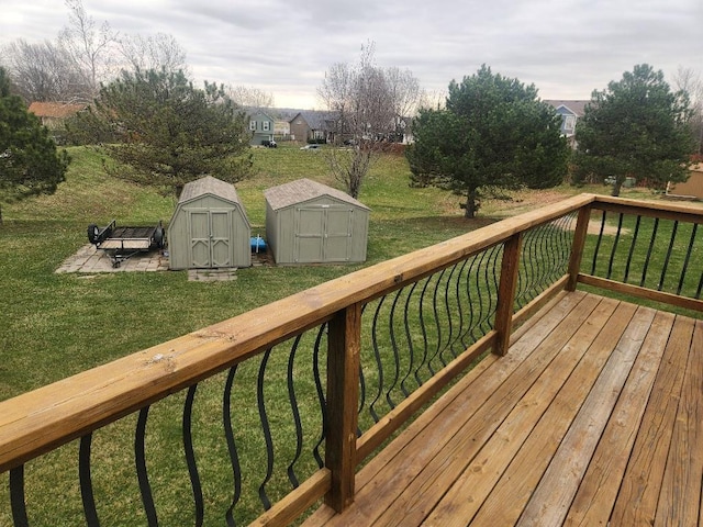 5773 Meadow Heights Dr, Shawnee, KS 66226 - deck featuring a shed, an outbuilding, and a lawn