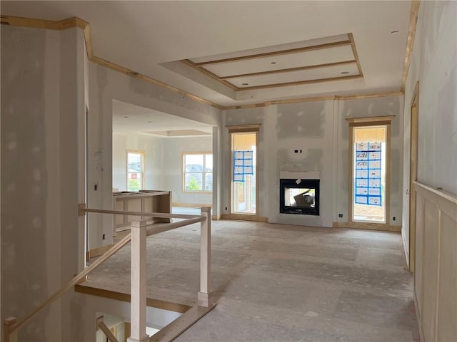 16929 Parkhill St, Overland Park, KS 66221 - unfurnished living room featuring a raised ceiling and a fireplace