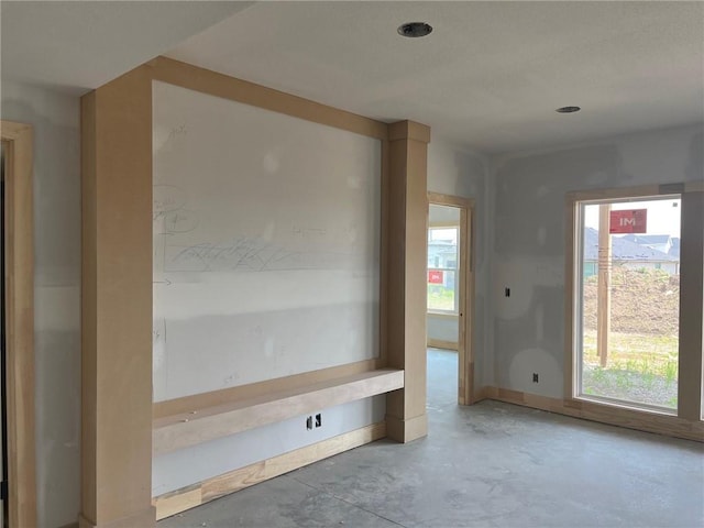 16929 Parkhill St, Overland Park, KS 66221 - empty room featuring concrete flooring