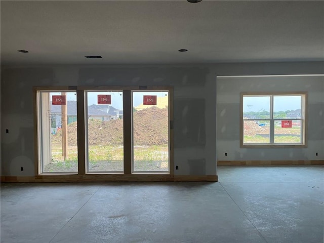 16929 Parkhill St, Overland Park, KS 66221 - unfurnished room featuring concrete floors and baseboards