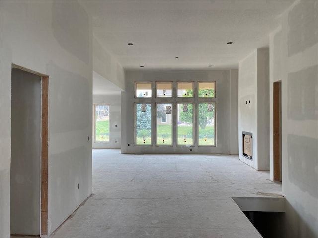 3010 NE 102nd St, Kansas City, MO 64155 - unfurnished living room featuring a fireplace