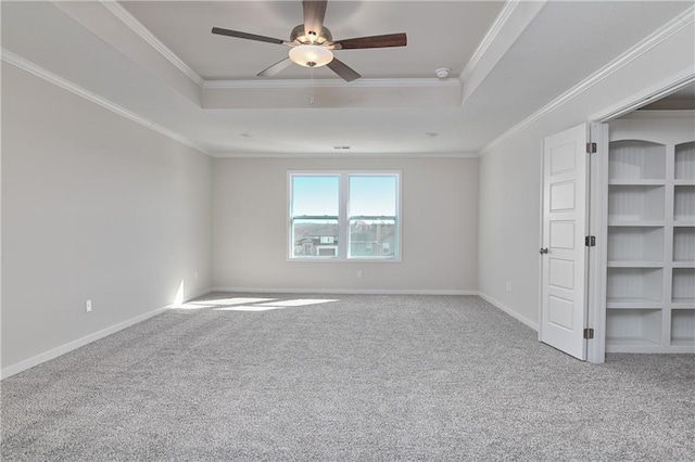 11410 S Langley St, Olathe, KS 66061 - unfurnished bedroom with crown molding, baseboards, carpet, and a raised ceiling