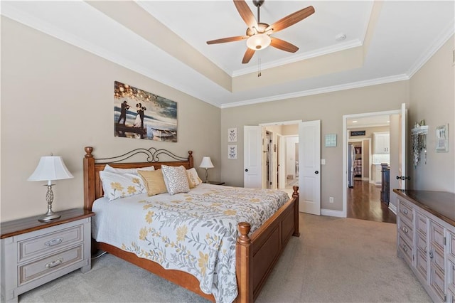 11481 S Waterford Dr, Olathe, KS 66061 - bedroom with light colored carpet, a raised ceiling, crown molding, and ceiling fan