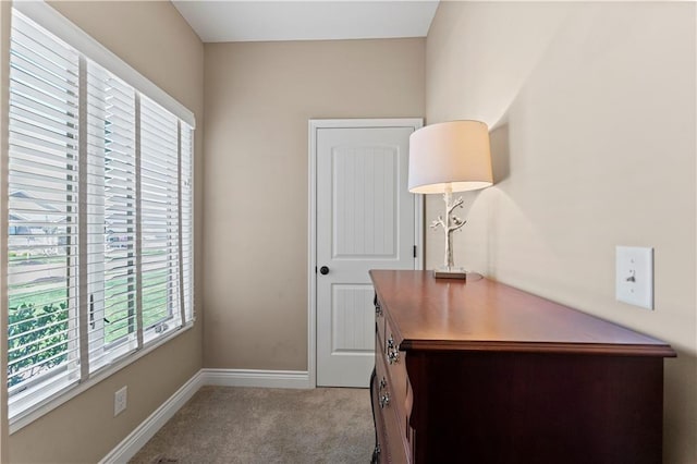 11481 S Waterford Dr, Olathe, KS 66061 - office area featuring plenty of natural light, carpet flooring, and baseboards