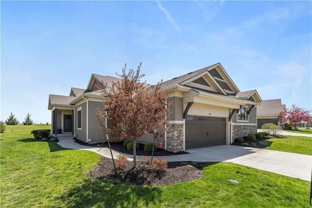 11481 S Waterford Dr, Olathe, KS 66061 - view of front of property featuring a garage, stucco siding, driveway, and a front yard