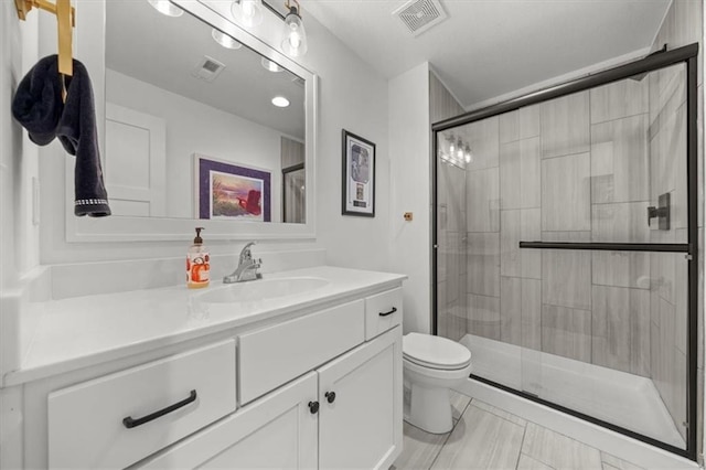 2428 W 179th St, Overland Park, KS 66085 - bathroom featuring toilet, a shower stall, and vanity