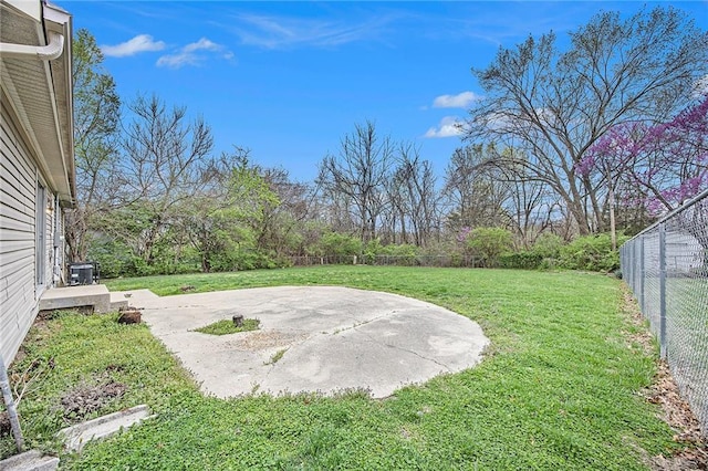 view of yard featuring a patio and a fenced backyard