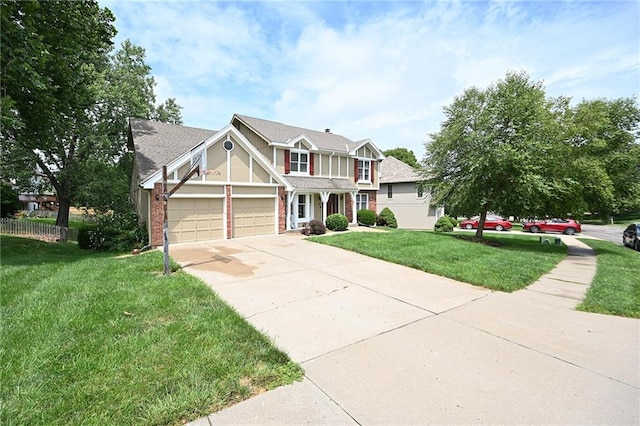 2406 NE 78th Ter, Kansas City, MO 64118 - view of front of home featuring driveway, brick siding, and a garage