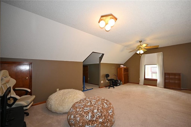 2406 NE 78th Ter, Kansas City, MO 64118 - additional living space featuring carpet, ceiling fan, vaulted ceiling, and baseboards