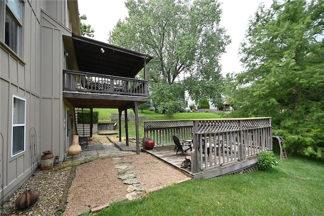 2406 NE 78th Ter, Kansas City, MO 64118 - view of grassy yard featuring a wooden deck