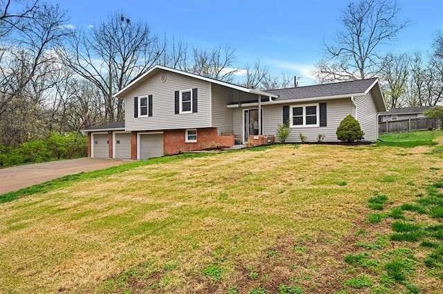 510 S 17th St, Leavenworth, KS 66048 - split level home with an attached garage and driveway