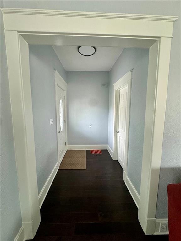 2518 N 12th St, Kansas City, KS 66104 - corridor with baseboards and wood finished floors
