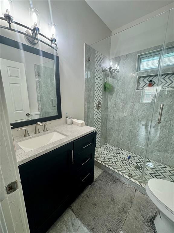 2518 N 12th St, Kansas City, KS 66104 - bathroom featuring a shower stall, toilet, and vanity