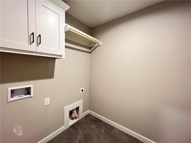 16965 S Mahaffie St, Olathe, KS 66062 - laundry area with electric dryer hookup, washer hookup, cabinet space, and baseboards