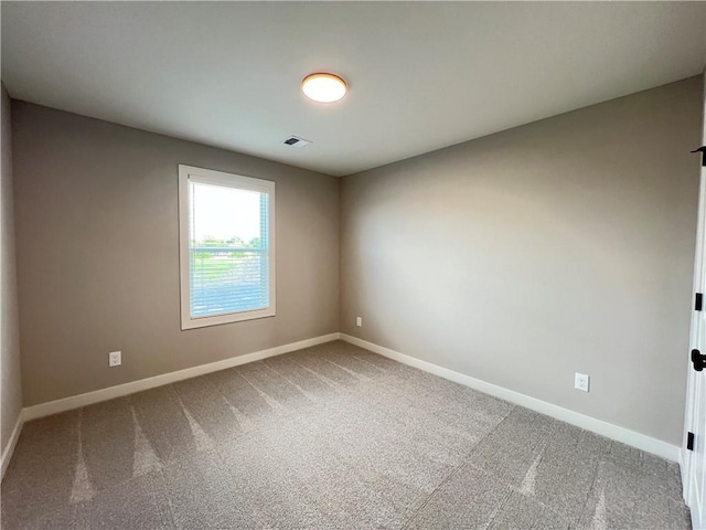 16965 S Mahaffie St, Olathe, KS 66062 - carpeted spare room with baseboards