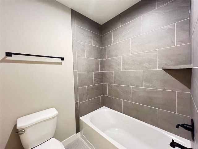 16965 S Mahaffie St, Olathe, KS 66062 - bathroom with toilet, shower / washtub combination, and baseboards