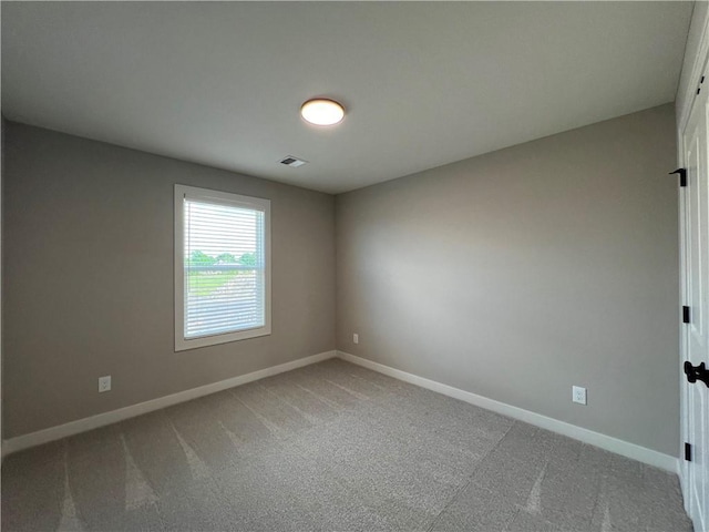 16965 S Mahaffie St, Olathe, KS 66062 - carpeted spare room with baseboards