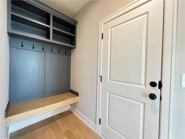 16965 S Mahaffie St, Olathe, KS 66062 - mudroom with baseboards and wood finished floors