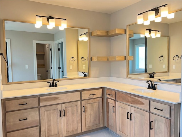 16965 S Mahaffie St, Olathe, KS 66062 - bathroom with double vanity and toilet