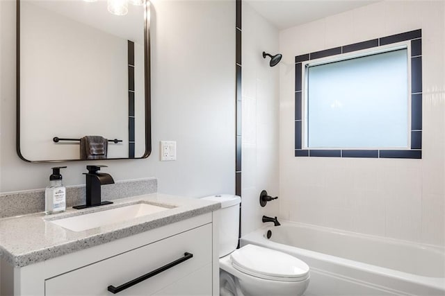 full bathroom featuring toilet, vanity, and bathing tub / shower combination
