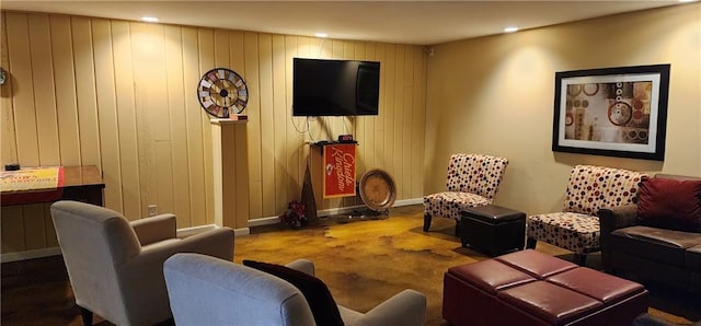 living area with recessed lighting and baseboards