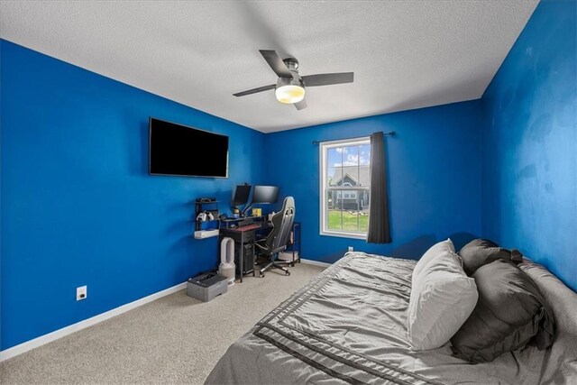 2357 SW Current Ct, Lees Summit, MO 64082 - bedroom featuring baseboards, carpet, a ceiling fan, and a textured ceiling