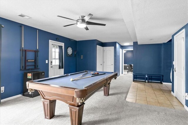 2357 SW Current Ct, Lees Summit, MO 64082 - rec room with baseboards, ceiling fan, a textured ceiling, and light colored carpet