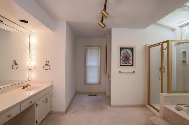 1313 NW 12th St, Blue Springs, MO 64015 - bathroom featuring a shower stall, vanity, a bath, and baseboards