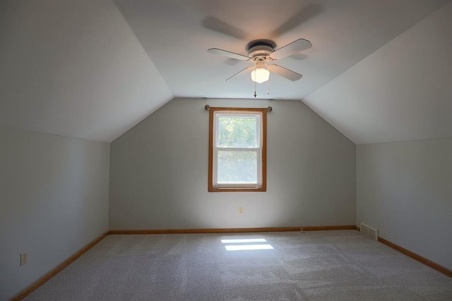 1313 NW 12th St, Blue Springs, MO 64015 - additional living space featuring lofted ceiling, a ceiling fan, carpet flooring, and baseboards