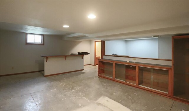 1313 NW 12th St, Blue Springs, MO 64015 - basement featuring baseboards and recessed lighting