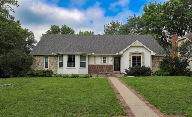 1313 NW 12th St, Blue Springs, MO 64015 - ranch-style home featuring a front lawn, a shingled roof, stone siding, and stucco siding