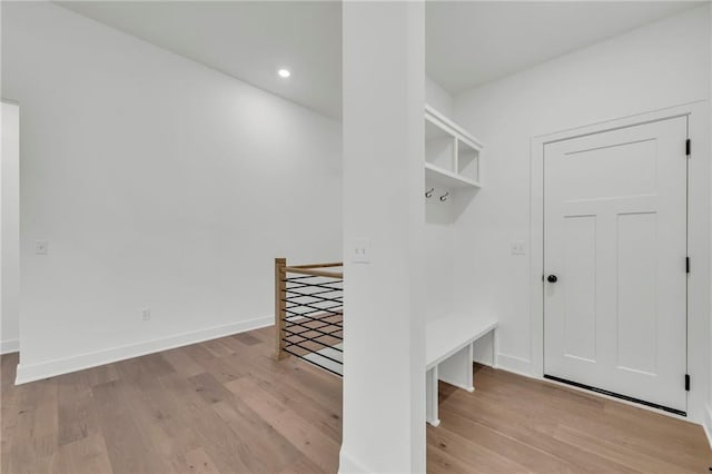 502 Seventh St, Smithville, MO 64089 - mudroom with light wood-type flooring, recessed lighting, and baseboards