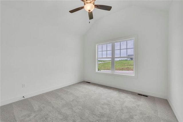 502 Seventh St, Smithville, MO 64089 - unfurnished room with carpet, a ceiling fan, vaulted ceiling, and baseboards