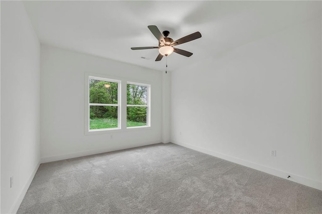 502 Seventh St, Smithville, MO 64089 - carpeted empty room with baseboards and a ceiling fan