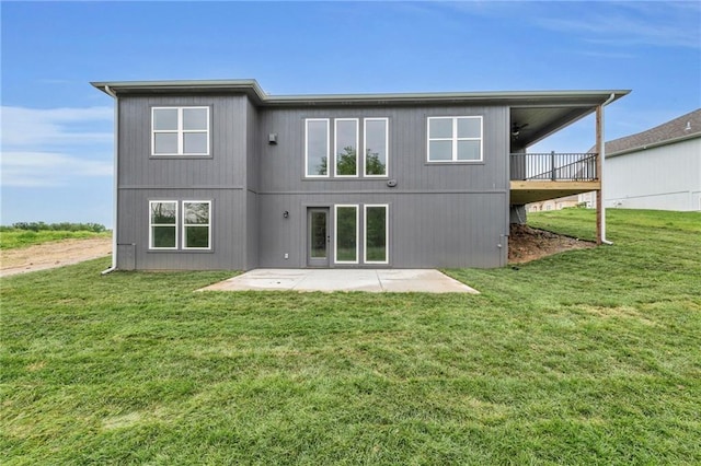 502 Seventh St, Smithville, MO 64089 - rear view of property with a patio area and a lawn