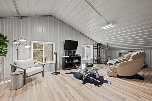 33345 W 95th St, De Soto, KS 66018 - living area with vaulted ceiling and wood finished floors