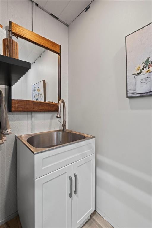 33345 W 95th St, De Soto, KS 66018 - bar featuring light wood finished floors and a sink