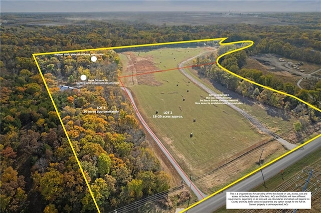 33345 W 95th St, De Soto, KS 66018 - aerial overview of property's location with property parcel outlined and a forest