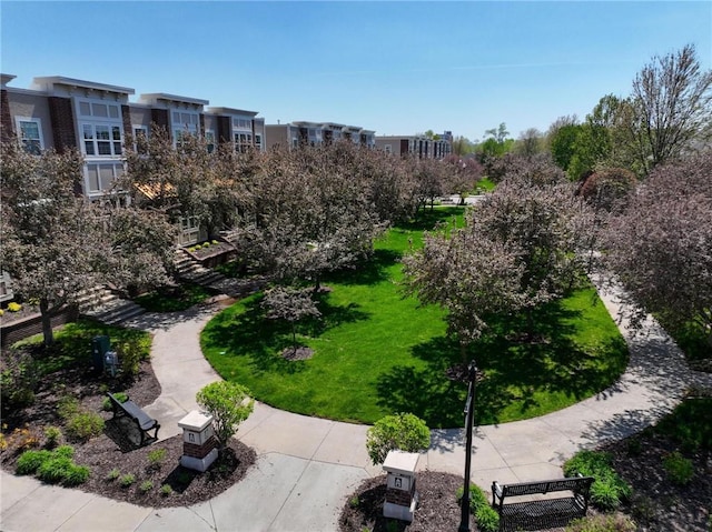 surrounding community with a yard