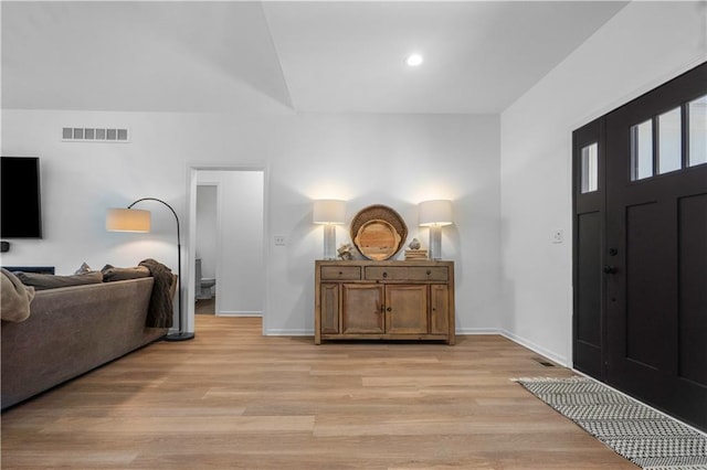 38 Lakeview Ln, Linn Valley, KS 66040 - entrance foyer with light wood-style floors, recessed lighting, and vaulted ceiling
