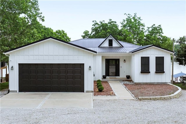 38 Lakeview Ln, Linn Valley, KS 66040 - modern farmhouse featuring board and batten siding, a garage, driveway, and a metal roof