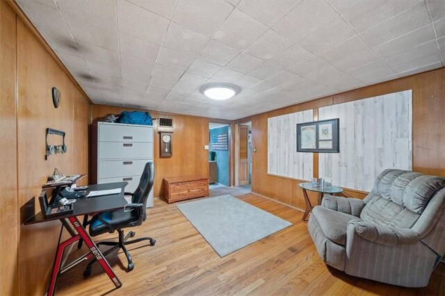 4401 N Holmes St, Kansas City, MO 64116 - office area featuring wood walls and wood finished floors