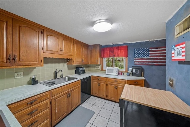 4401 N Holmes St, Kansas City, MO 64116 - kitchen featuring brown cabinetry, dishwasher, a sink, and white microwave