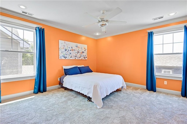 3205 SW Rockbridge Dr, Lees Summit, MO 64081 - carpeted bedroom featuring baseboards, visible vents, and ornamental molding