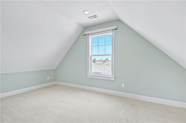 3205 SW Rockbridge Dr, Lees Summit, MO 64081 - bonus room with visible vents, baseboards, vaulted ceiling, and carpet