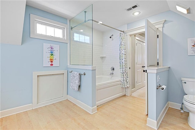 3205 SW Rockbridge Dr, Lees Summit, MO 64081 - full bath with visible vents, wood finished floors, toilet, baseboards, and shower / bathtub combination with curtain